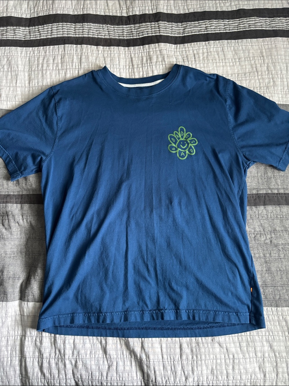 Men's Blue Short-Sleeve Tee with Green Flower Graphic